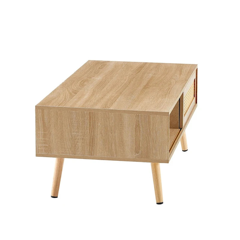 Table basse moderne avec panneau de porte en rotin tressé et pieds en bois massif