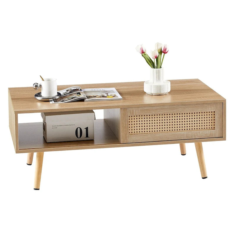 Table basse moderne avec panneau de porte en rotin tressé et pieds en bois massif